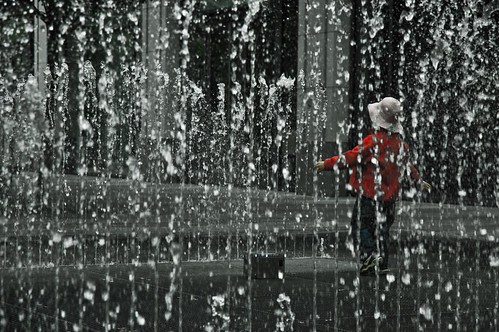 Children Playing In Rain