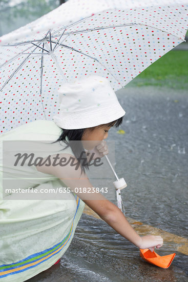 Children Playing In Rain