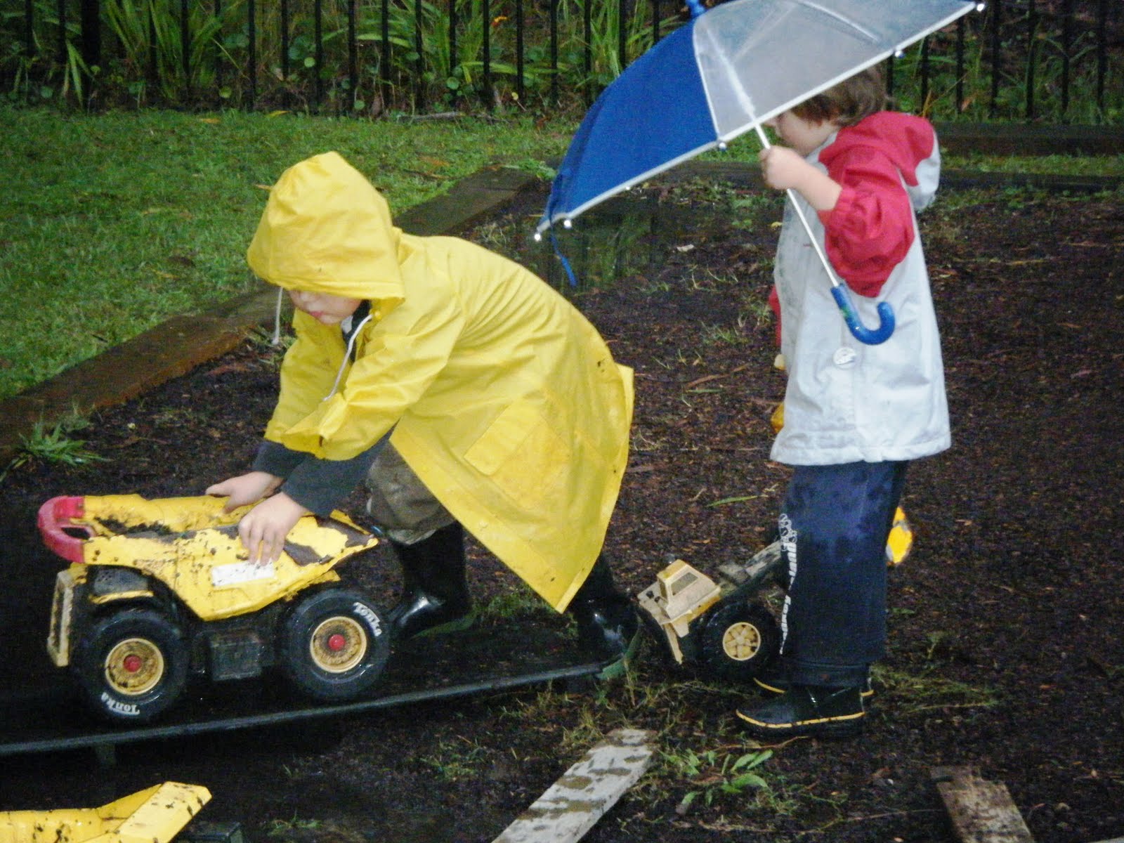 Children Playing In Rain Images