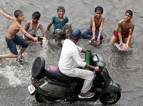 Children Playing In Rain Images