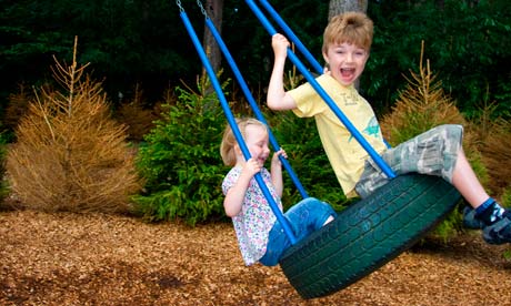 Children Playing Outside In The Park