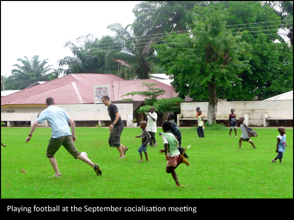 Children Playing Football At School