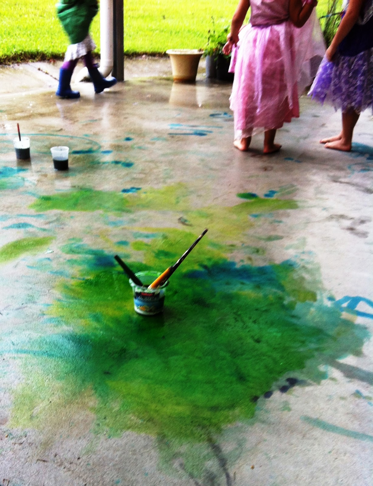 Children Playing In Rain