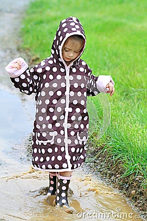 Children Playing In Rain