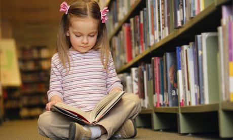 Children Reading Books With Parents