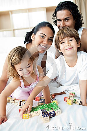 Parents And Children Playing Together